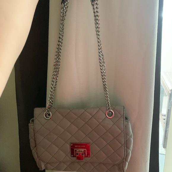 Michael Kors, very gently used you can use around body or single shoulder wear. - Picture 2 of 3